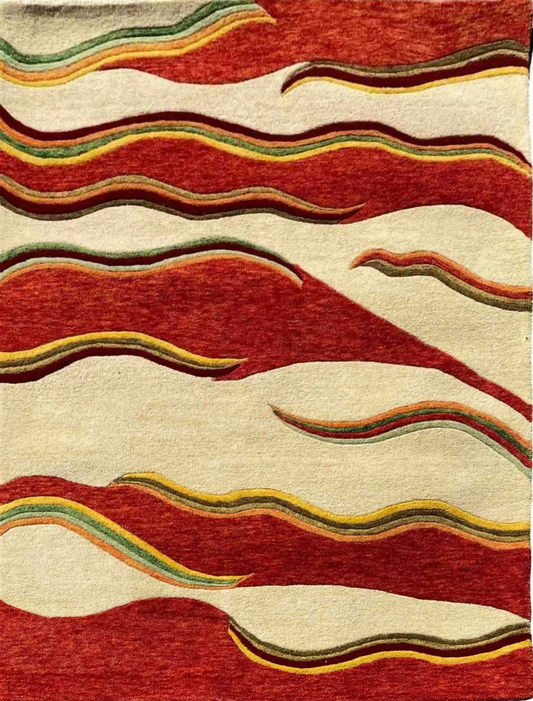 A hand-tufted rug with a vibrant red background and cheerful yellow accents, featuring a geometric pattern.