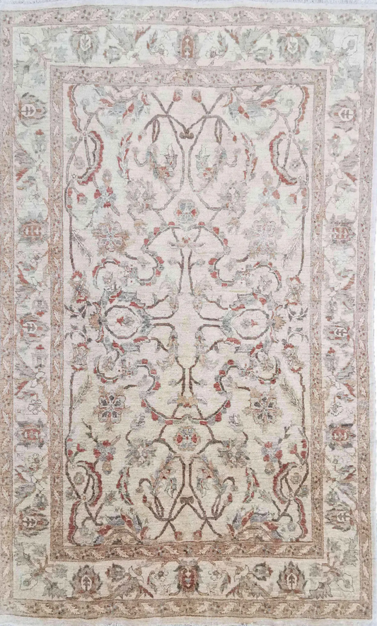 A beige wool rug with brown secondary accents, featuring intricate floral designs and a traditional Persian influence in the pattern.