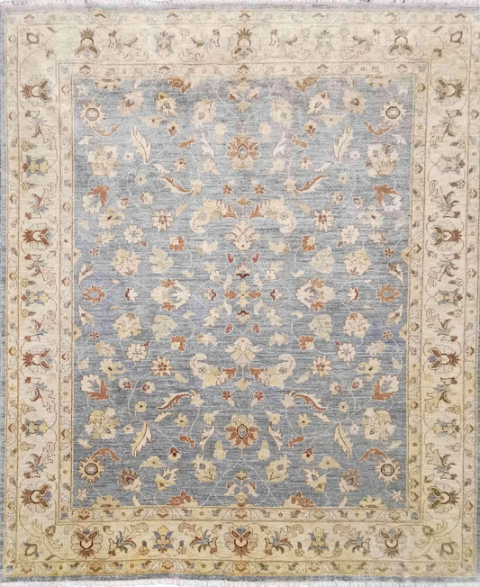 A Ziegler wool rug with a blue background and beige floral patterns, featuring intricate borders.