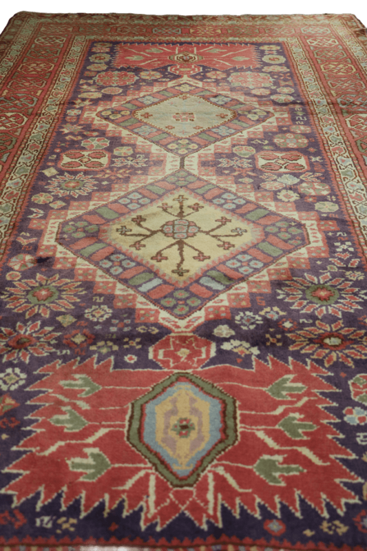A rectangular Anatolian Tribal Wool Rug