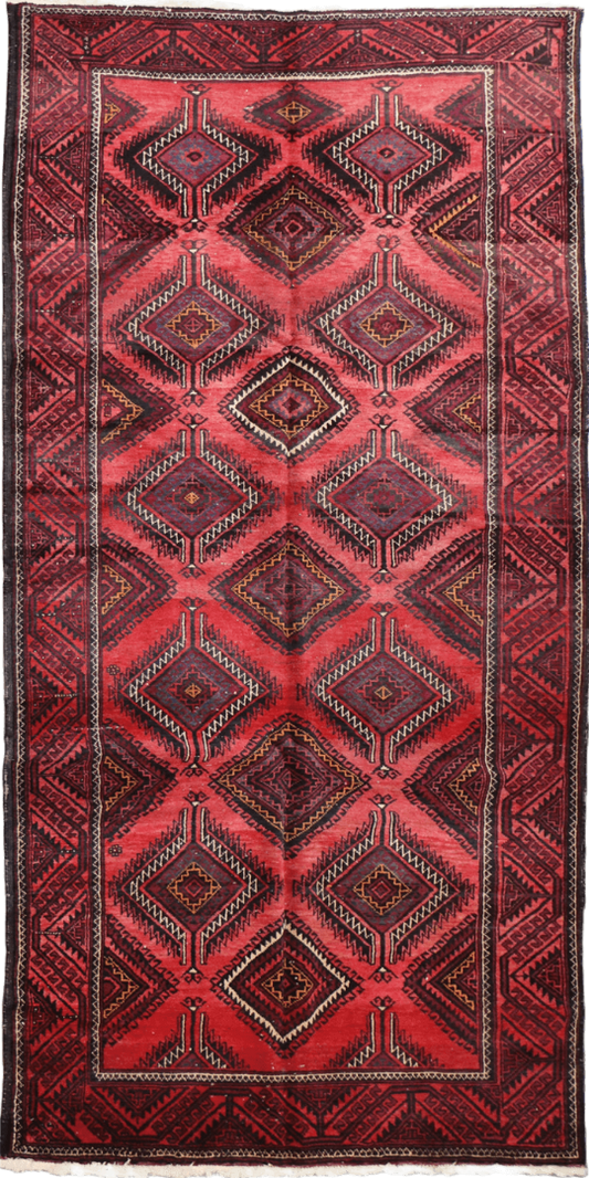 A hand-knotted Afghan Tribal Wool Rug
