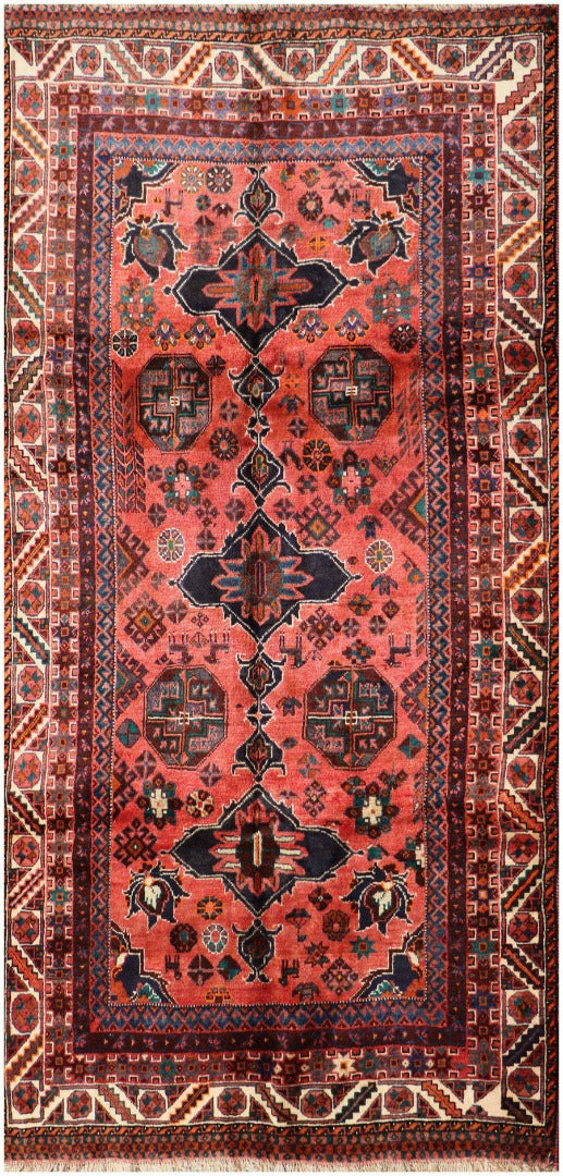 A vibrant Persian Qashqai rug