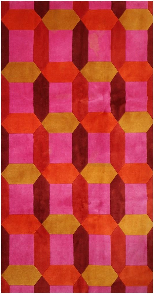 A geometric patterned wool rug