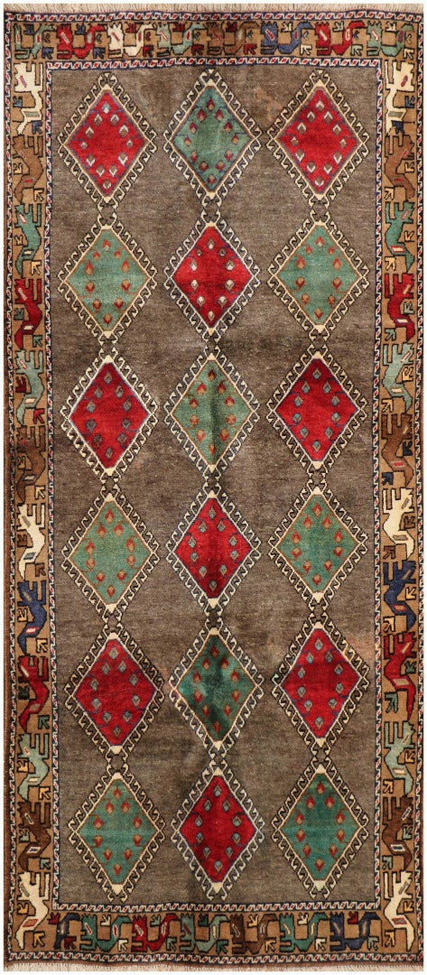 A rectangular Persian Qashqai Tribal Rug