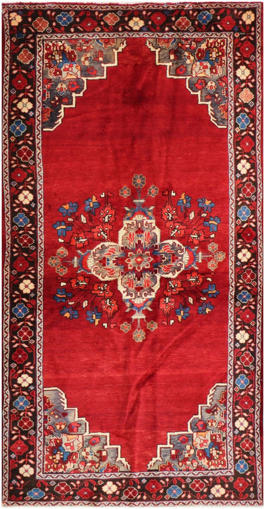A vibrant red wool rug