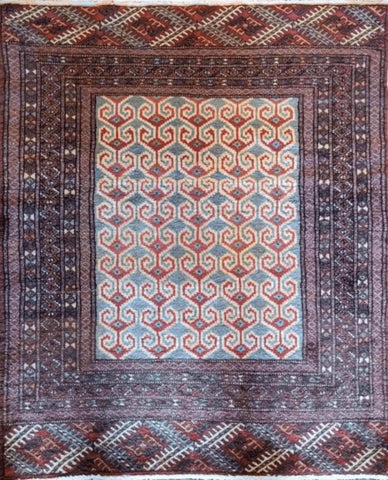 An Old Bukhara Tribal Beige Wool Small Rug with beige field and blue geometric patterns, measuring 119 x 92 cm.