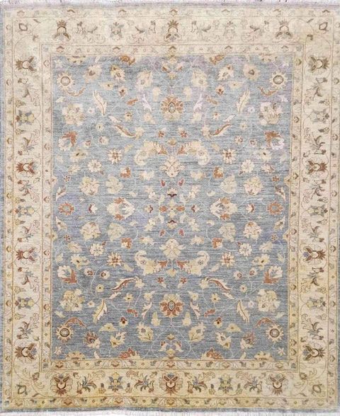A Ziegler wool rug with a blue background and beige floral patterns, featuring intricate borders.