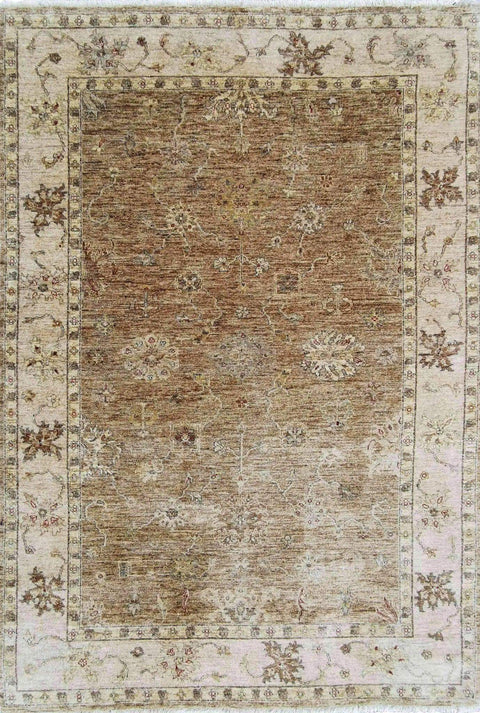 A traditional Ziegler wool rug with beige background and brown floral patterns, rectangular in shape.