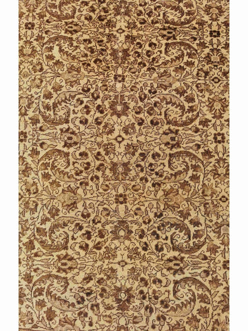 A beige and brown colored wool rug with a traditional geometric pattern.