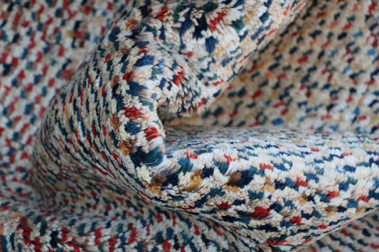 Multi coloured wool tribal rug