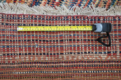 Back of tribal multi coloured rug