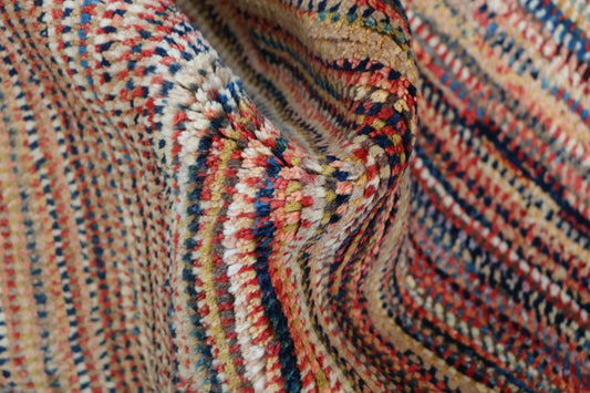 Thick pile multi coloured handmade tribal rug