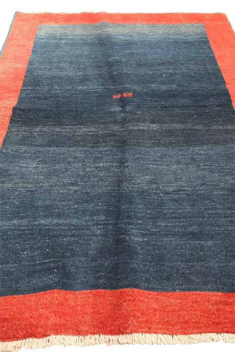A traditional Gabeh Tribal Wool Rug