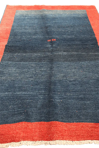 A traditional Gabeh Tribal Wool Rug