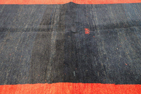 A traditional Gabeh Tribal Wool Rug