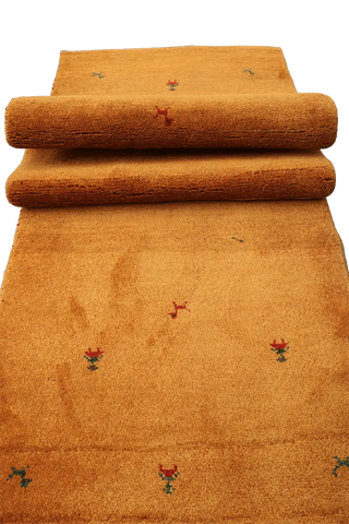 Close-up view of a Gabbeh Runner Tribal Wool Rug 
