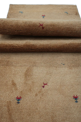 Close-up view of a Gabbeh Runner Tribal Wool Rug 