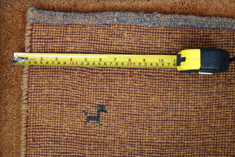 Close-up view of a Gabbeh Runner Tribal Wool Rug 