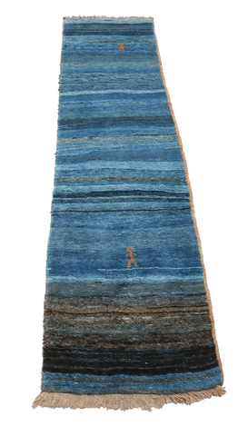 A vertical image of a Gabbeh Runner Tribal Wool Rug