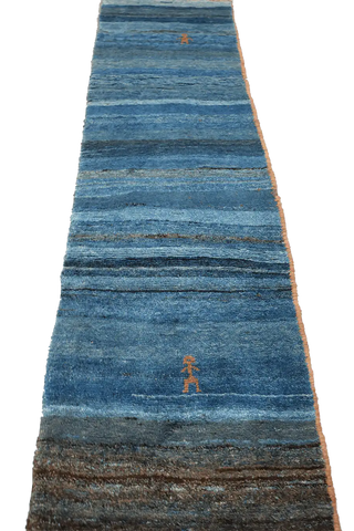 A vertical image of a Gabbeh Runner Tribal Wool Rug