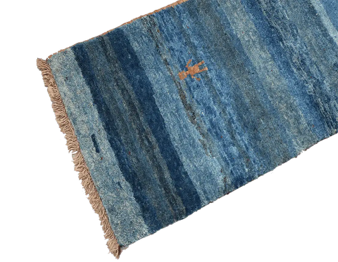 A vertical image of a Gabbeh Runner Tribal Wool Rug