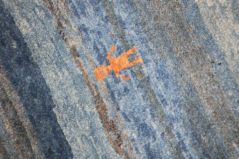 A vertical image of a Gabbeh Runner Tribal Wool Rug