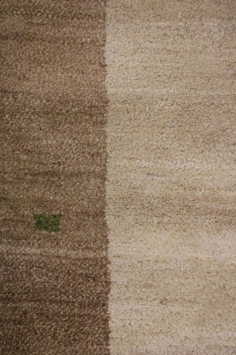 A traditional Gabbeh Tribal Wool Rug