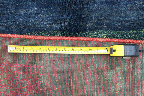 A rectangular Gabbeh Tribal Wool Rug