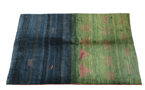 A rectangular Gabbeh Tribal Wool Rug