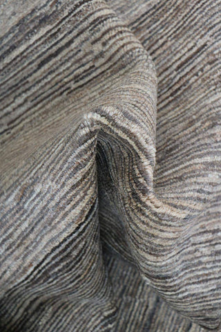 A rectangular Gabbeh Tribal Wool Rug with a mix of grey and cream hues, featuring a traditional hand-knotted design.