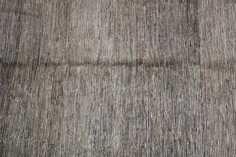A rectangular Gabbeh Tribal Wool Rug with a mix of grey and cream hues, featuring a traditional hand-knotted design.