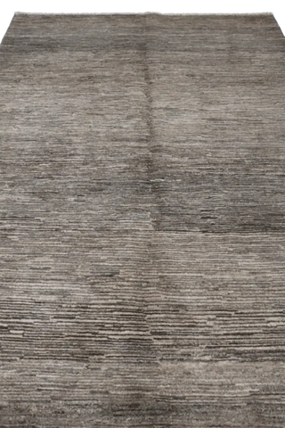 A rectangular Gabbeh Tribal Wool Rug with a mix of grey and cream hues, featuring a traditional hand-knotted design.