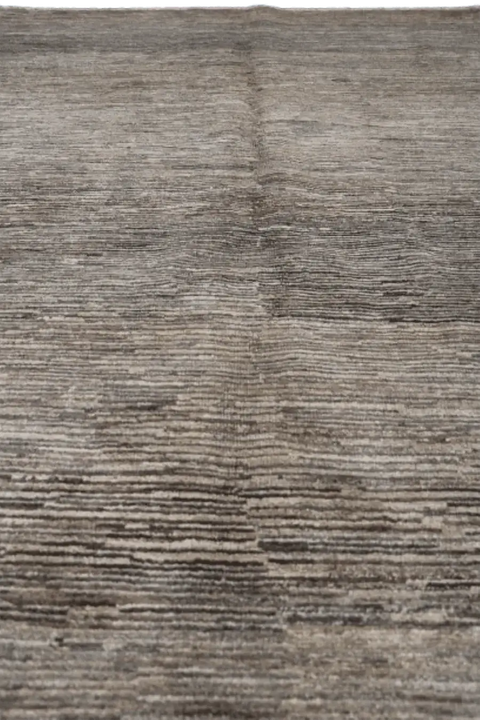 A rectangular Gabbeh Tribal Wool Rug with a mix of grey and cream hues, featuring a traditional hand-knotted design.