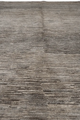 A rectangular Gabbeh Tribal Wool Rug with a mix of grey and cream hues, featuring a traditional hand-knotted design.