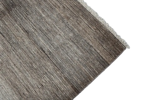 A rectangular Gabbeh Tribal Wool Rug with a mix of grey and cream hues, featuring a traditional hand-knotted design.