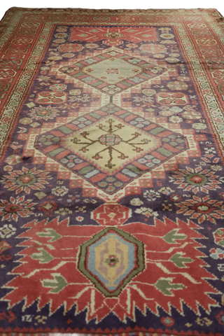 A rectangular Anatolian Tribal Wool Rug