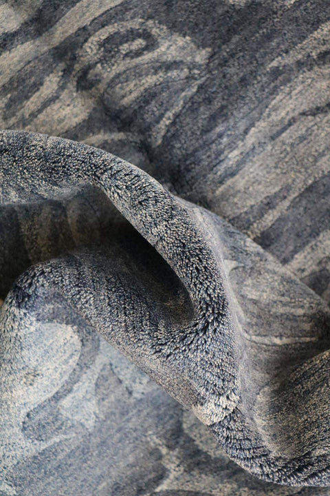 A modern contemporary tribal wool rug