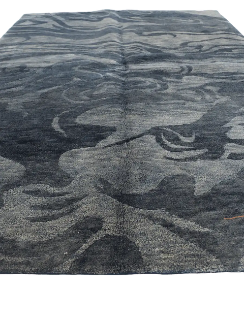 A modern contemporary tribal wool rug