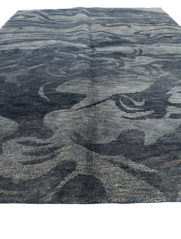 A modern contemporary tribal wool rug
