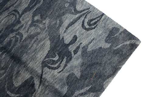 A modern contemporary tribal wool rug