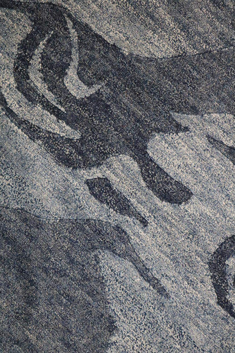 A modern contemporary tribal wool rug