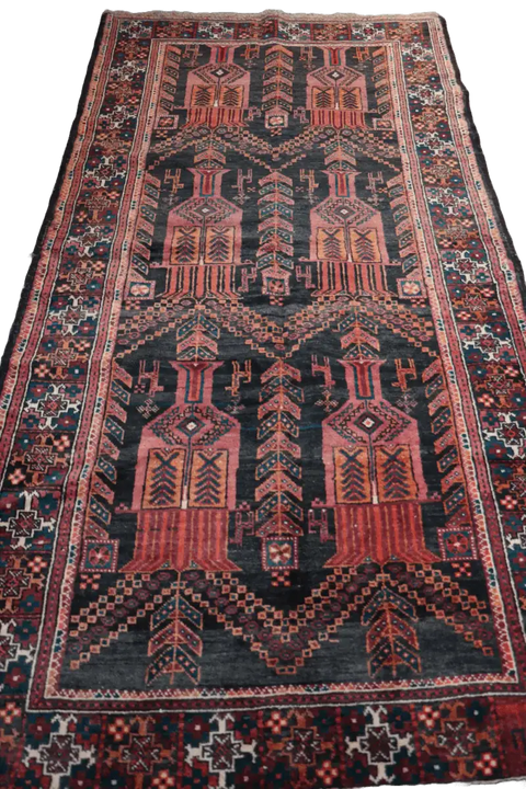 A Persian Baluch Tribal Wool Rug