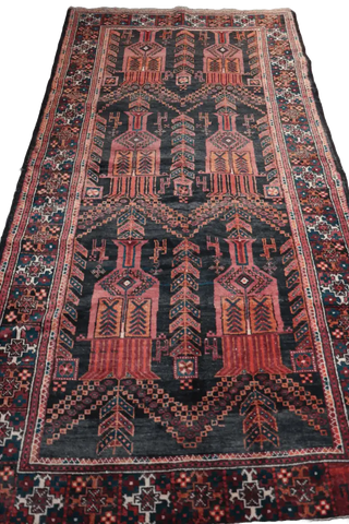 A Persian Baluch Tribal Wool Rug
