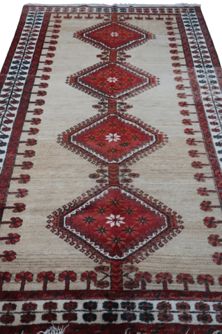A Persian Qashqai Tribal wool rug