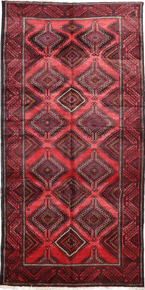 A hand-knotted Afghan Tribal Wool Rug