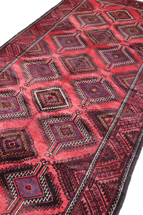 A hand-knotted Afghan Tribal Wool Rug