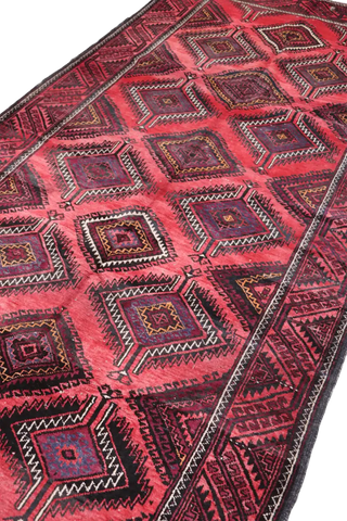 A hand-knotted Afghan Tribal Wool Rug