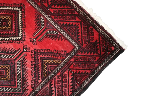 A hand-knotted Afghan Tribal Wool Rug