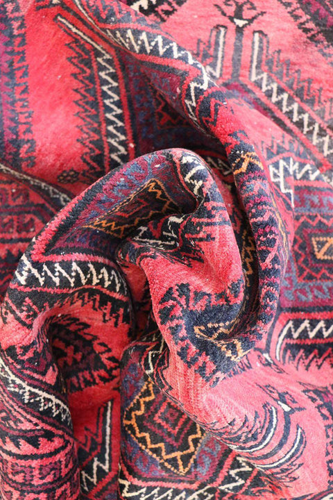 A hand-knotted Afghan Tribal Wool Rug