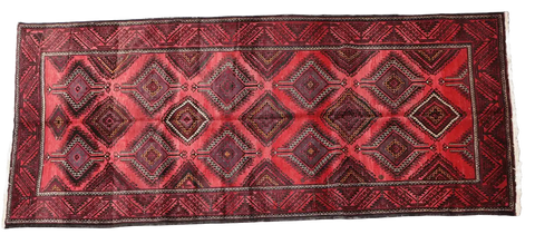 A hand-knotted Afghan Tribal Wool Rug